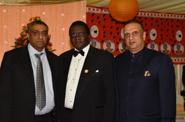 Some of the businessmen at the event take the opportunity to pose for the camera with the First Gentleman Chief Justioce Richard Banda Retired