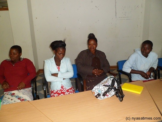 Some participants to the meeting paying attention to Mwale's presentation