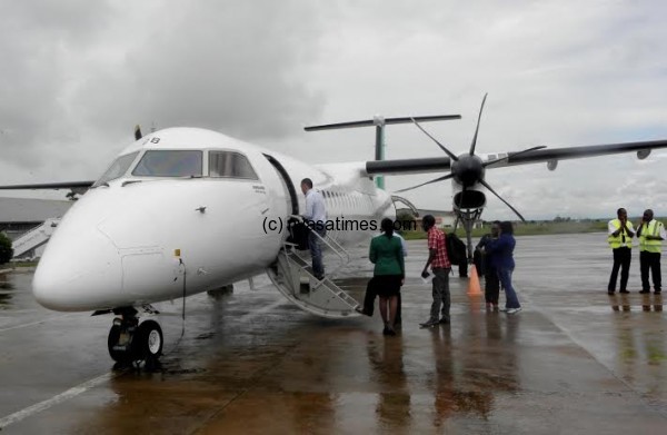 The  Bombardier Q400 parked at the Malawi airport