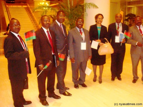 Some senior government officials await the arrival of President Banda at Grand Intercontinental Hotel in Yokohama, Japan