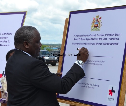 Speaker-Rt. Hon. Richard Msowoya MP Speaker of National Assembly signs on theHe 4 She Commitment at Parliament Building-Pic. by Abel Ikiloni