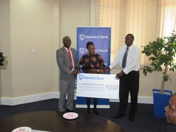 Standard Bank moves Malawi Sports Writers forward: Donates return airticket to France
