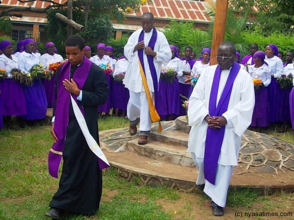 St Pius and Chirombwe Parish priests after laying their wreath....Photo Jeromy Kadewere