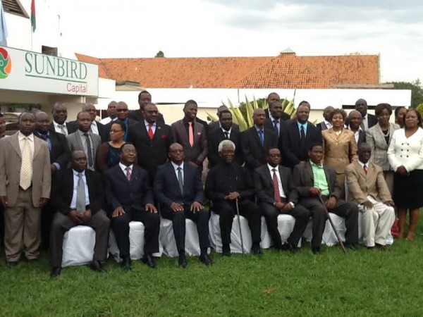Stakeholders pose for a group photo after the MOU signing in ceremony