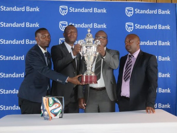 Standard Bank, Fam officials show off the Standard Bank Knockout cup, Pic Alex Mwazalumo