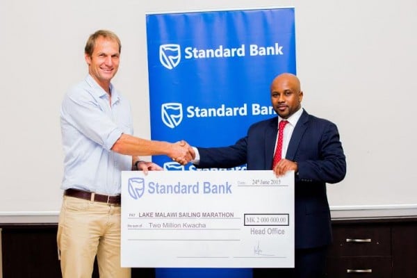 Standard Bank presenting the cheque