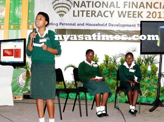 Students discuss financial literacy issues in Malawi.
