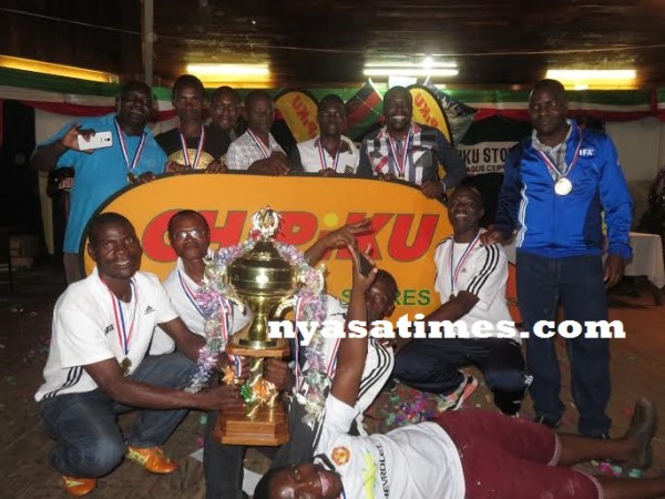 Super League bound Dwangwa pose with the trophy