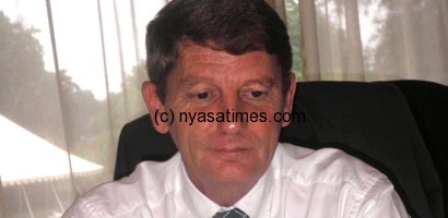 Surestream’s general manager Keith Robinson promises to establish football academy in Mzuzu