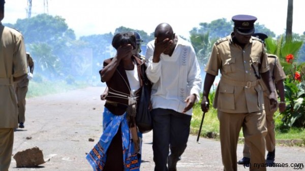 Malawi police fired teargas at DPP supporters  protesting the arrests outside police headquarters in Blantyre, but the protesters failed to disperse and retaliated by throwing stones.