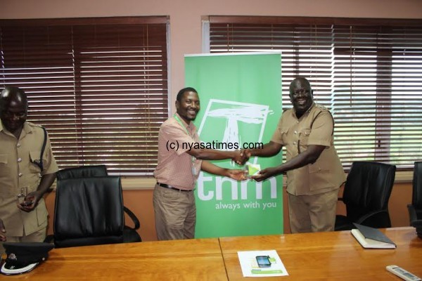 M’thete presenting the donation  to Mangani—Picture courtesy of FD Communications Ltd