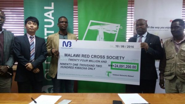 TNM donates the money to Red Cross Society