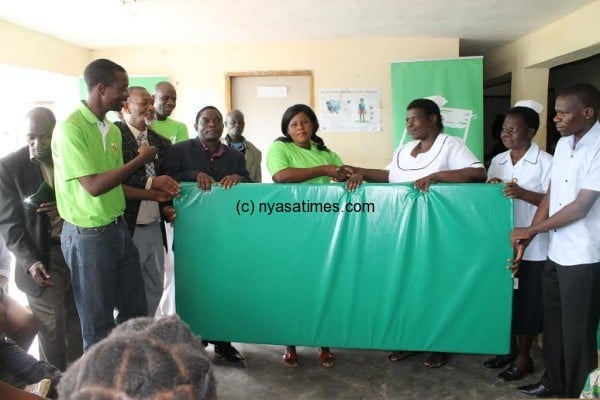 TNM presenting the donation at Mbayani health centre