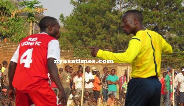 Tension between the referee and a Reds player....Photo Jeromy Kadewere