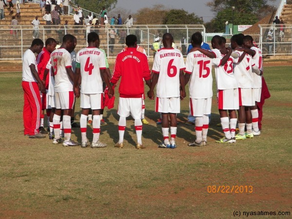 Thank God, we are in the semis, Blantyre United pray after the game, Pic Leonard Sharra, Nyasa Times