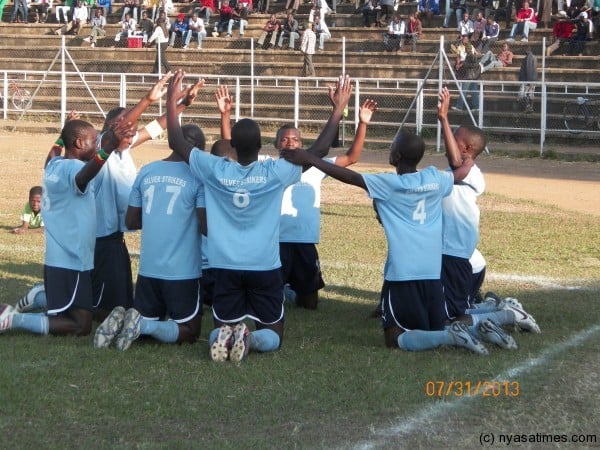 Thanks giving, Silver players say a prayer after 2nd goal, Pic Leonard Sharra, Nyasa Times