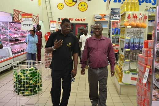 The CAMA Executive Director Mr. John Kapito with Billy Mayaya roam in  Shoprite before the closure in Lilongwe-Pic. by Abel Ikiloni