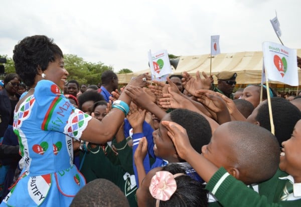 The First Lady Madame Mutharika cheers Pupils after the launch - Pic by Stanley Makuti