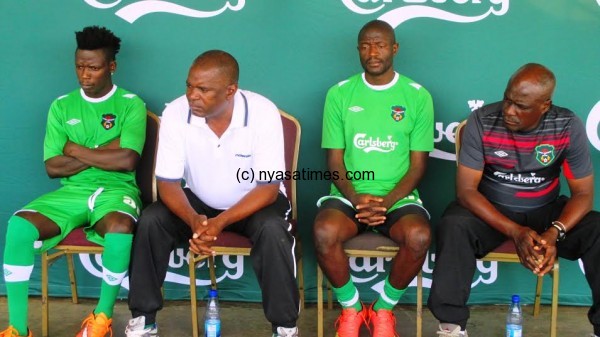 The Flames coach Chimodzi (2nd from left)  and captains during  the news conference...Photo Jeromy Kadewer