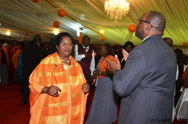 The President dances with one of the invited guests