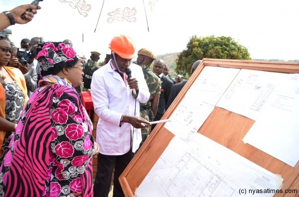 The President is taken through the construction map of the Health Centre