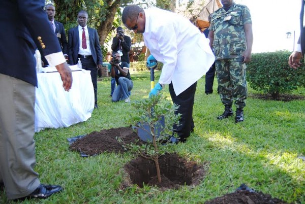 The Vice President Saulos Klaus Chilima plants a tree at Sunbird Nkopola Lodge as symbol of a strong relationship between four countries making Rotary International District 9210. Pic Arnold Namanja (MANA)