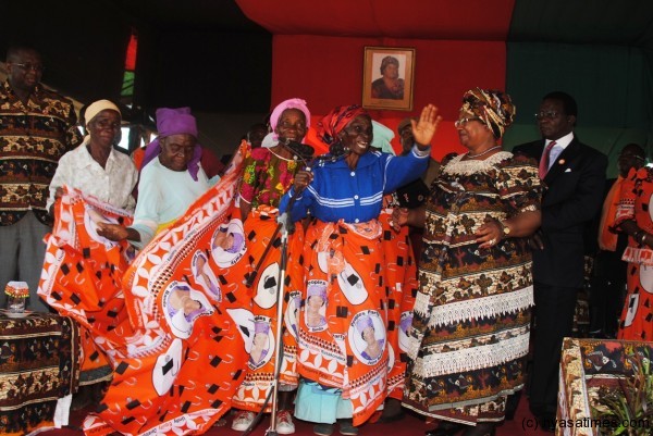 The chiefs' wives are dressed in the ruling PP cloth during the ceremony
