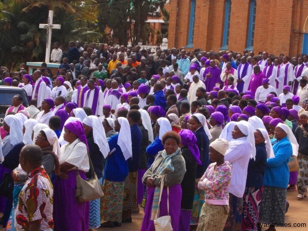 The congregation outside the church.