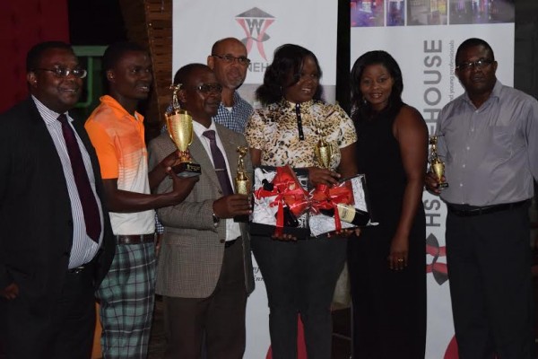 The golfers with their trophies