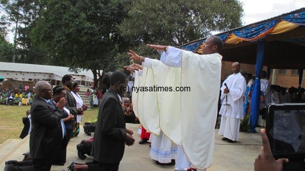 The ordained priests blessing their parents....Photo Jeromy Kadewere