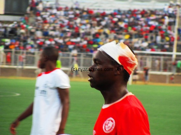 Flashback: Douglas Chirambo's head wrapped  in bandage after cut