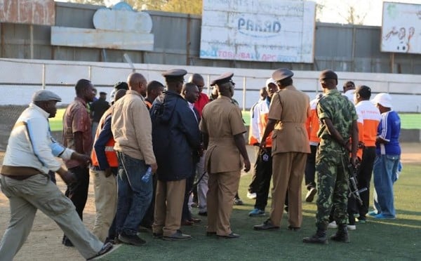 The security personel and football officials in discussions .-Photo Jeromy Kadewere