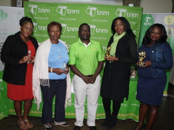 The winners of second tournament  with Dvaid Nyirenda, TNM's head of Blantyre division