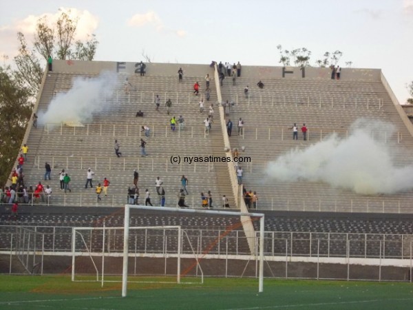 Teargas in the stands were fired to unruly fans.-Photo by Jeromy Kadewere, Nyasa Times