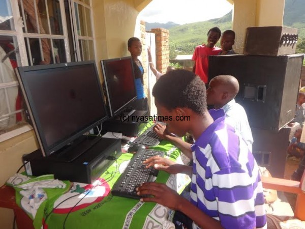 This is how we do it. Some youth using the computer when accessing SRH&R.
