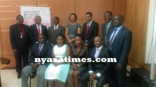Total Malawi officials in a group photo with members of the jury.