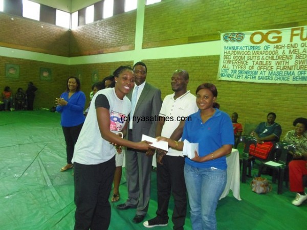 Towera Vinkhumbo receiving her best defender prize.-Photo Jeromy Kadewere