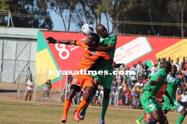 Moyale and Wanderers players tussling for the ball...Photo Jeromy Kadewere