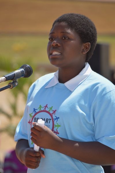 Vannessa Banda a student from Nkhamenya Girls Secondary school reciting a poem at the event.(C)govati  Nyirenda