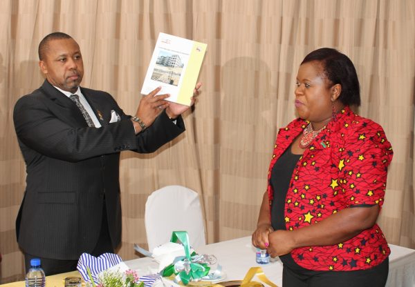  Vice-President-Dr.Saulos-Chilima-accompanied-by-Chief-Executive-for-National-Construction-Industry-Ms.Linda-Phiri-launches-the-CoST-Malawi-Assurance-report-C-Stanley-Makuti