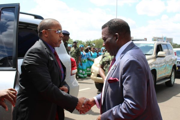 Body language check: Vice President Dr.Saulos Chilima is met by the Minister of Agriculture Dr.George Chaponda at the launch (C)Stanley Makuti