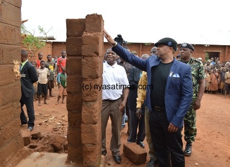 Vice President Rt.Hon.Chilima inspects house collapsed with heavy rains at Chipala Primary School in Area 49 - Pic by Stanley Makuti