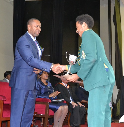 Vice President Saulos Chilima shakes hands with Manuel De Jesus as he presents a prize to him at KAs Speech and Prize Giving Day - Pic by Abel Ikiloni