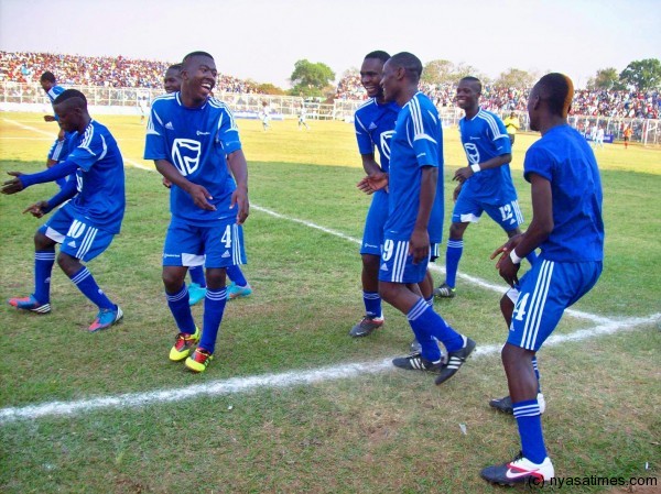 Clearance: Victor Mpinganjira celebrating his first goal together with his colleagues