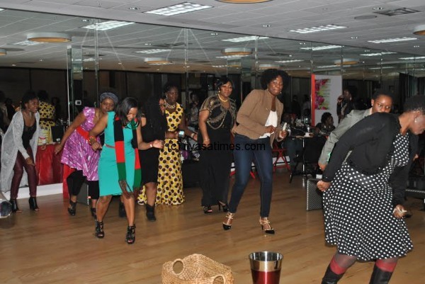 WAMFRE Fundraiser Reception March 27, 2015 as  members join in on Pelekani-Pelekani in dance