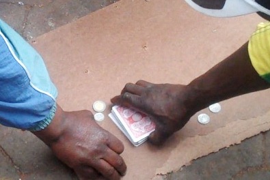 Wachionandani  gambling game commonly played by  street traders