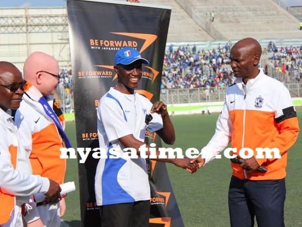 Wanderers chairman George Chamangwana hands over the keys to Father Rapozo...Photo Jeromy Kadewere
