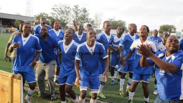 Wanderers players celebrate win fo charity shield against rivals Bullets.-Photo by Jeromy Kadewere, Nyasa Times
