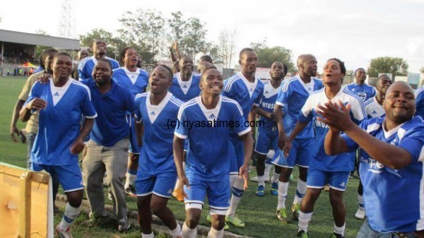 Wanderers players celebrate win fo charity shield against rivals Bullets.-Photo by Jeromy Kadewere, Nyasa Times
