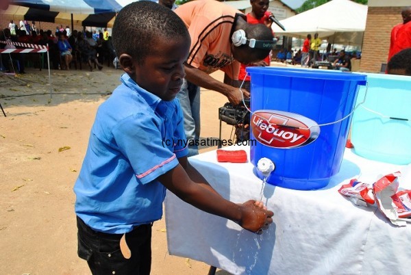 Washing hands using Lifebouy....Photo Jeromy Kadewere